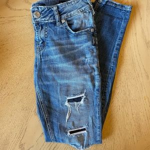 Suki Mid rise destruction skinnys